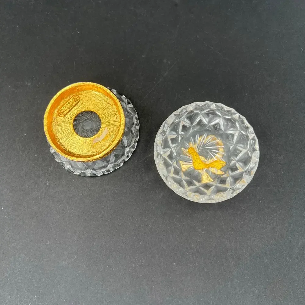 Stylebuilt trinket box, 24K gold plated and a crystal or glass top.
